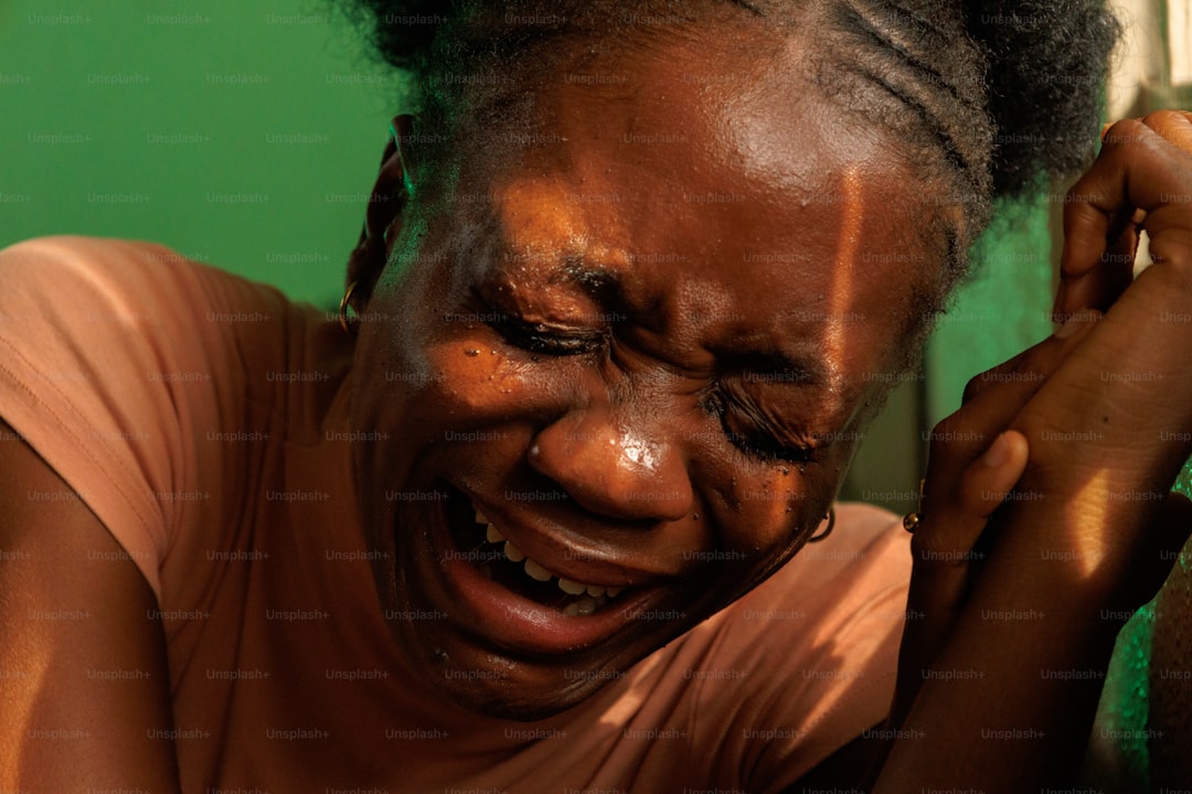 A woman is deeply weeping and full of emotion.